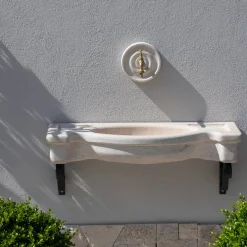 Lavabo semicircolare Sethra in travertino*Veltha Outdoor Stone Design Online