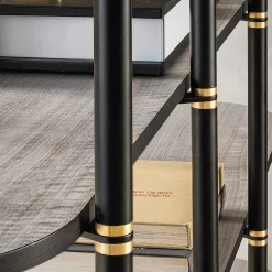 Libreria Boomerang in metallo nero e ottone con 4 ripiani di Pietro Russo Design*Casamilano Best