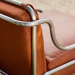 Poltrona Stringa 1963 in pelle marrone e acciaio di Gae Aulenti*Exteta Discount