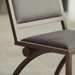 Sedia Cylindre in ferro con finitura bronzo e pelle*Tato Best