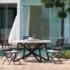 Tavolo da pranzo outdoor Hermu 150 in pietra travertino e acciaio marrone*Veltha Outdoor Stone Design Online